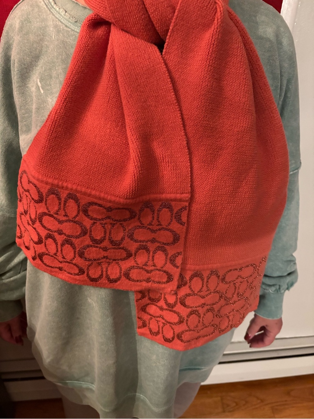 Coach Coral Glitter Edge Knit Scarf 60”.